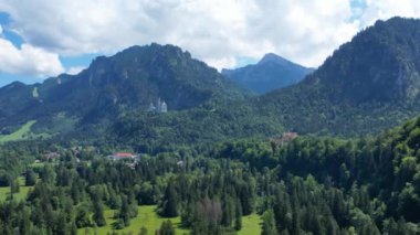 Aerial of famous Neuschwanstein Castle and surroundings in Bavaria Germany