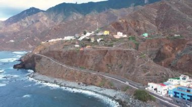 Aerial sunset view of dramatic Atlantic Ocean coastline of Anaga, steep cliffs and small villages, Tenerife, Canary Islands, Spain