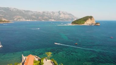 Aerial view of Budva, old and modern city on Adriatic Sea coast. Center of Montenegrin tourism and popular sea resort.