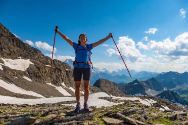 Sporty woman hiking in Switzerland alps. Heathy lifestyle, sport, beauty in nature. Grindelwald valley, Swizz clipart