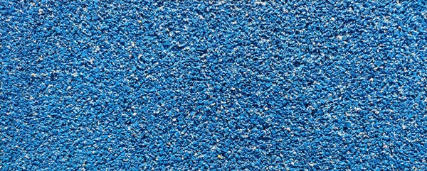 blue texture of sports flooring for horizontal background close-up