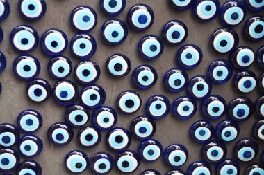 Blue eye of Fatima, Turkish amulet against corruption and evil eye Nazar for esoteric background close-up