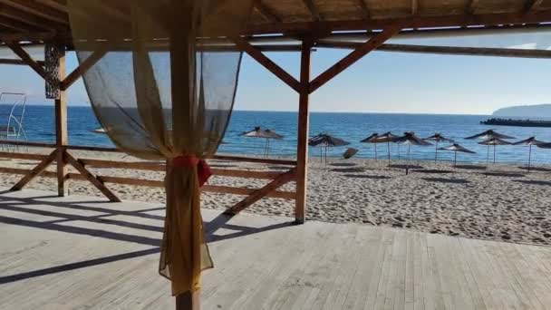 Light Curtains Flutter Wind Empty Outdoor Patio Beach Sea — Stock Video