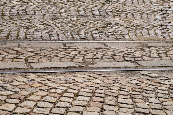舗装石舗装の古いレールヴィンテージ背景のための舗装 — ストック写真