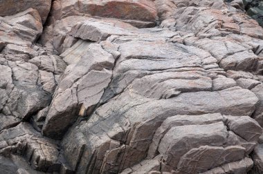 Gri kaya yakın plan, doğal taş arkaplan dokusu.