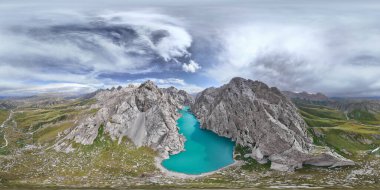 360 panorama of high mountain lake Kel Suu in sunny weather, birds eye view, turquoise color of water in a narrow mountain gorge clipart