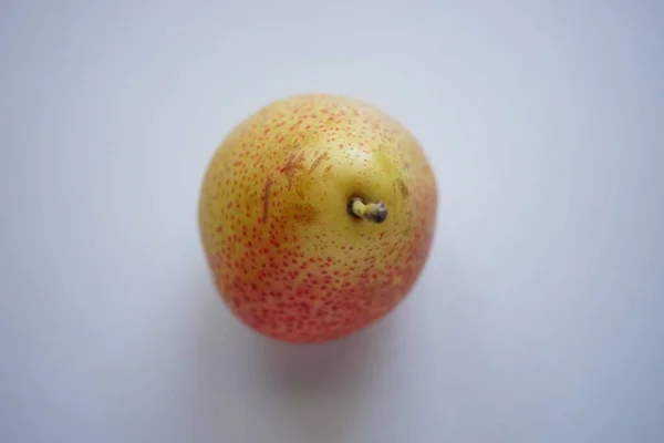 Yellow Orange Pear White Table — 스톡 사진