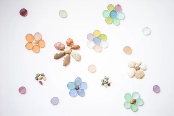 Art Floral Still Life Glass Pebbles Stone Flowers White Paper — Stock Photo, Image