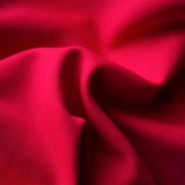 Yakın plan kırmızı forma, yumuşak kumaş arkaplan.