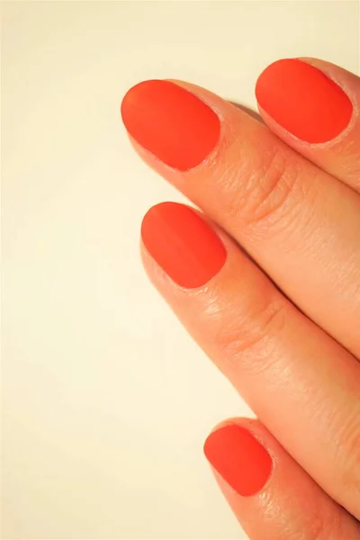 Matte Red Manicure Female Fingers White Table Mat Varnish — Zdjęcie stockowe