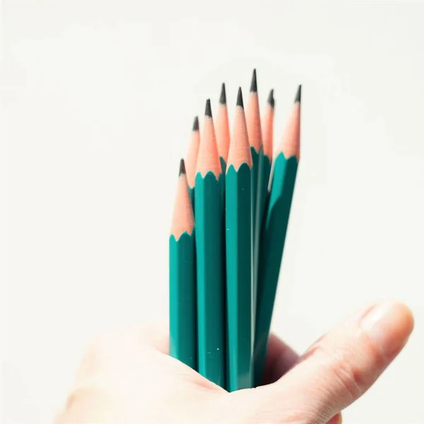 Green Set Graphite Pencils Hand White Wall Background — Stock Photo, Image