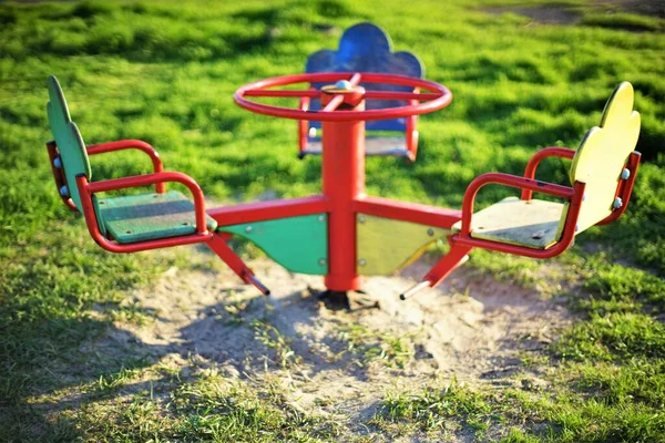 Outdoor Playground Carousel Grass Spring Sunset — Stock Photo, Image