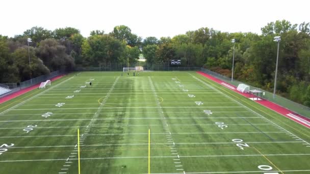 Aerial Drone Video Flying Forward High Altitude Football Field Public — Stock Video