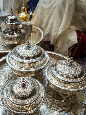 Madrid, Spain; January 19 2022. Traditional Moroccan decorated tea ceremony vessels at the Morocco stand in FITUR (International Tourism Trade Fair). Photography taken on January 19 2022 in Madrid, Spain.