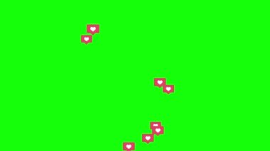 Floating icon with red heart for social networks on a green screen background. Animation background. Like sign.