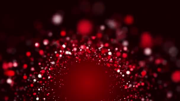 赤く輝く光沢のある円形の粒子が渦の周りを飛んでいる ダークループの背景にある抽象的な火のアニメーション — ストック動画
