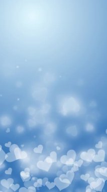 Mavi, yumuşak, bulanık arka plan ve uçan kalp şekilleri. Sevgililer Günü hareketli grafikleri döngüye soktu. Dikey video.