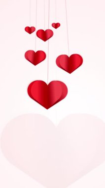 Kağıt kırmızı kalpler rüzgarda sallanıyor. Aşk sembollü, animasyon beyaz arka plan. Kutlama metni için boş bir yer. Dikey video.