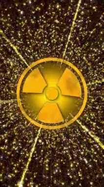 Radyasyon tehlikesi işareti. Küçük uçan parçacıklarla sarı parıltı. Nükleer enerji. Döngülü animasyon arka planı. Dikey video.