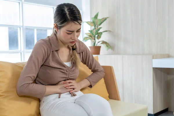 Asian Young Woman Suffering Stomach Ache Sitting Couch Living Room — Stock Photo, Image