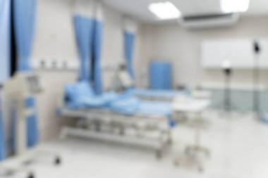 Boş acil servis, yoğun bakım odası, yoğun bakım ünitesi, hastane veya klinikteki ekipmanlı tıbbi yataklar ile bulanık görüntü geçmişi