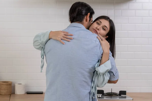 Romantic lover embracing in kitchen, Young handsome man making proposal give a ring to surprise his girlfriend for ask her to marry at home, They will marry together