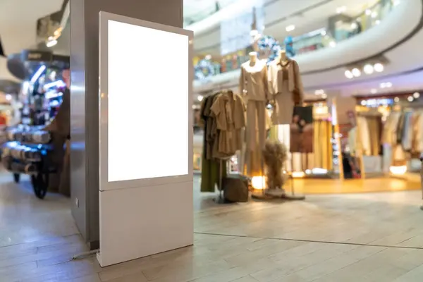 Vertical blank LED TV Screen stand in shopping mall. Perfect for showcasing your logo and branding.