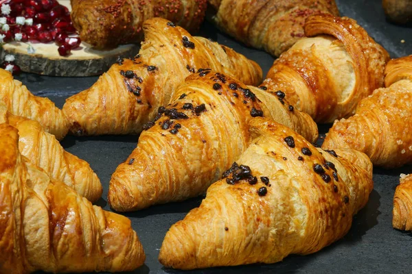 Stock image pastries and croissants with chocolate chips for a delicious breakfast