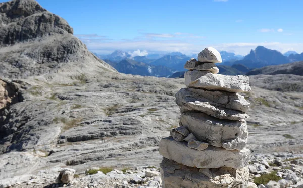 pile of stones called CAIRN for the orientation of hikers or as a symbol of prayer in the mountains