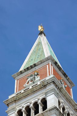 Gilded angel on the tip of the bell tower of Saint Mark in Venice in Italy