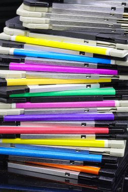Old floppy disks used to save computer data in the 90s