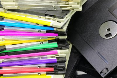 Old floppy disks used to save computer data in the 90s