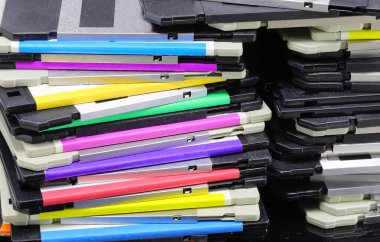 Background of floppy disks used to save computer data in the 90s