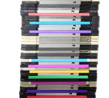 Old floppy disks used to save computer data in the 90s