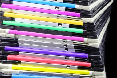 Old floppy disks used to save computer data in the 90s