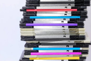 Old floppy disks used to save computer data in the 90s