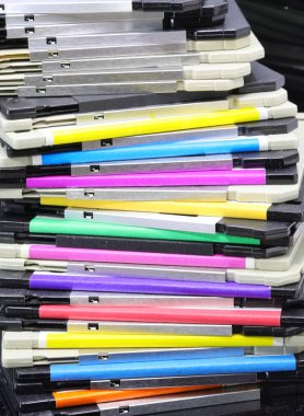 Old floppy disks used to save computer data in the 90s