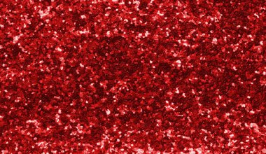 red background with shiny glitter type glitter material with lights