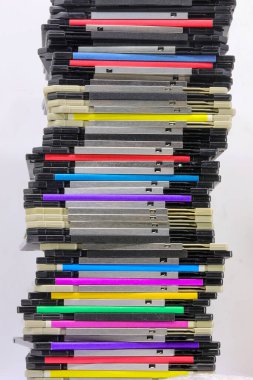 Old floppy disks used to save computer data in the 90s