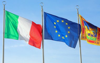 Venice, VE, Italy - November 6, 2022: Three Big Flags Italy Europe and Veneto Region