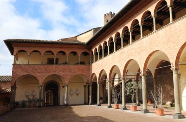 Siena, SI, Italy - February 20, 2023: Ancient cloister of the convent of the Basilica of San Domenico