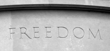 big text FREEDOM in the building capital letters