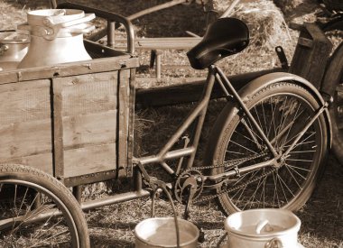 bike used by milkman to transport the milk cans with sepia tone