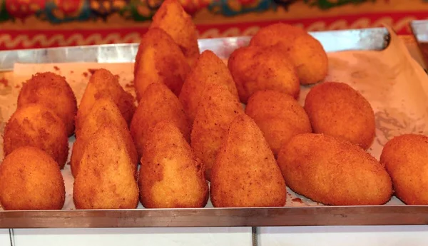 Arancini are a typical food from Southern Italy made with fried rice meatballs