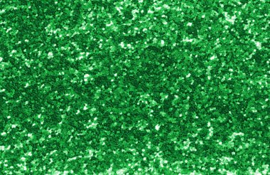 Işıltılı, parlak, pırıl pırıl, arka planda parlak yeşil, pırıl pırıl yeşil.
