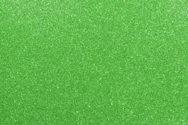 Işıltılı, parlak, pırıl pırıl, arka planda parlak yeşil, pırıl pırıl yeşil.