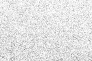 Beyaz arka plan ışık ve yansımalarla parıldıyordu.