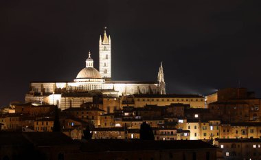 Night view of illuminated Siena Cathedral in Central Italy