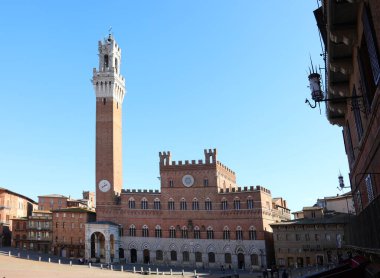 high tower called TORRE DEL MANGIA in the main square of SIENA in central Italy