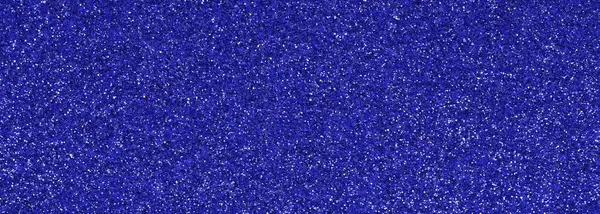 BLUE GLITTERY sparkling background with bright reflections and many small lights